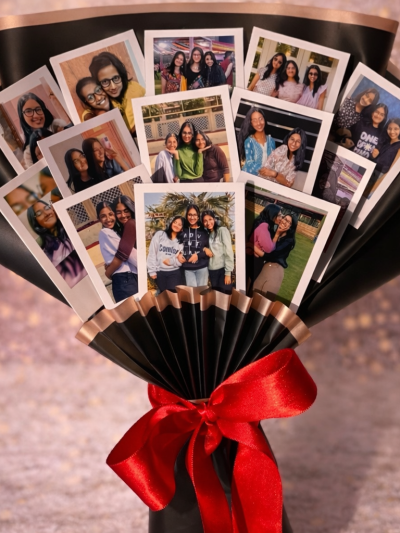 Photograph bouquet with red ribbon