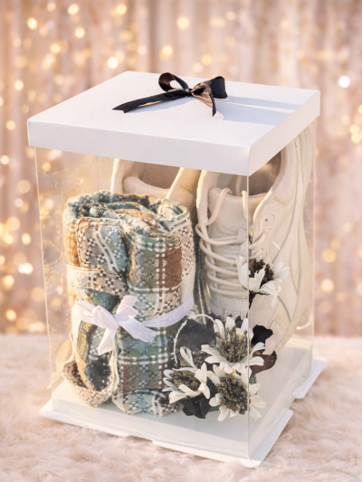 Luxury gift box with sneakers and bouquet